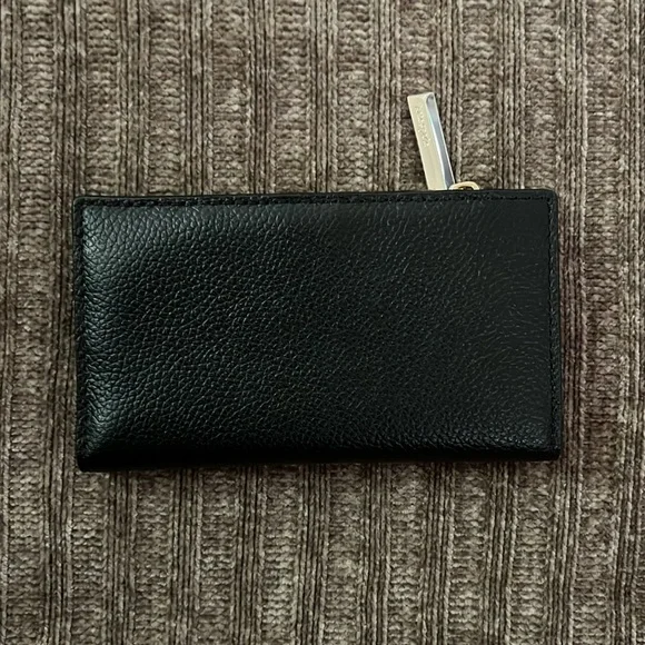 Kate spade bi-fold Spencer Slim in black with gold tone hardware. - Picture 2 of 6